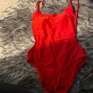 Red sexy one piece swim suit .